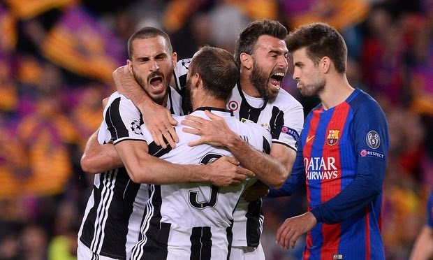 Juventus defenders Leonardo Bonucci, Giorgio Chiellini and Andrea Barzagli celebrate after their second clean sheet against Barcelona. Photograph: Josep Lago/AFP/Getty Images
